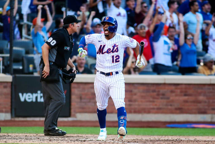 Jul 9, 2022; New York City, New York, USA; New York Mets shortstop Francisco Lindor (12) reacts after hitting a two run home run in the sixth inning against the Miami Marlins at Citi Field.